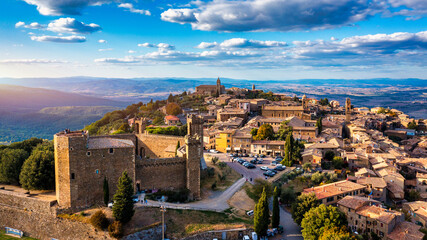 Fototapeta premium View of Montalcino town, Tuscany, Italy. The town takes its name from a variety of oak tree that once covered the terrain. View of the medieval Italian town of Montalcino. Tuscany