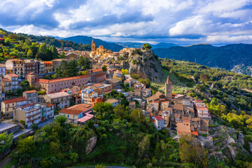 Fototapeta na wymiar Amazing cityscape of Novara di Sicilia town. Aerial view of Novara di Sicilia, Sicily, Italy, Europe. Mountain village Novara di Sicilia, Sicily, Italy.