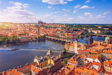 Prague scenic spring aerial view of the Prague Old Town pier architecture Charles Bridge over Vltava river in Prague, Czechia. Old Town of Prague with the Castle in the background, Czech Republic.