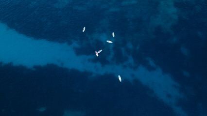 aerial imagery 4k of land and sea with boats