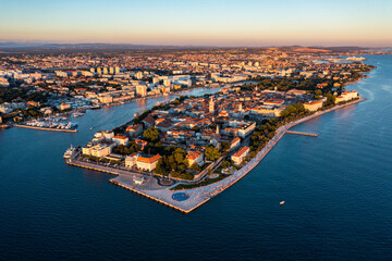 Fototapeta premium Aerial view of the Old Town of Zadar, Croatia. Aerial shot of Zadar old town, famous tourist attraction in Croatia. City of Zadar historic peninsula roman architecture aerial view, Croatia