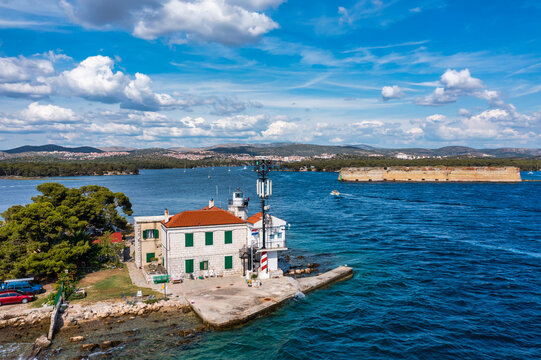 Jadrija lighthouse in Sibenik bay entrance aerial view, archipelago of Dalmatia, Croatia. Aerial view of lighthouse in town of Jadrija in Sibenik bay in Croatia, beautiful seascape.