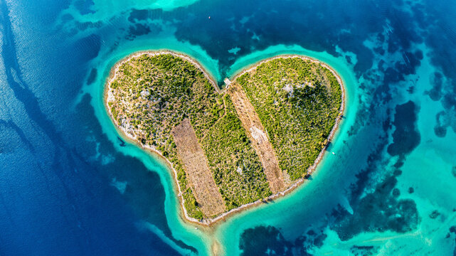Aerial view of the heart shaped Galesnjak island on the adriatic coast, Zadar, Croatia. Heart shaped island of Galesnjak in Zadar archipelago aerial view, Dalmatia region of Croatia.