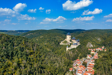 Royal Castle Karlstejn. Central Bohemia, Karlstejn village, Czechia. Aerial view to The Karlstejn...