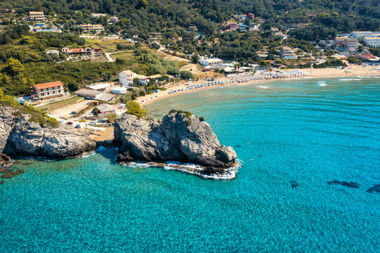 Aerial drone view over western coast and Glyfada beach, Island of Corfu, Greece. Glyfada Beach at Corfu Greece during the day.