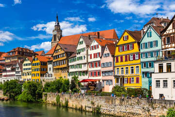 Beautiful floral colorful town Tubingen in Germany (Baden-Wurttemberg). Houses at river Neckar and Hoelderlin tower, Tuebingen, Baden-Wuerttemberg, Germany. Tubingen, Germany.