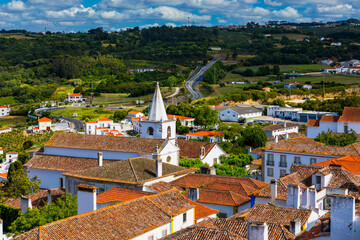 Obidos, Portugal stonewalled city with medieval fortress, historic walled town of Obidos, near Lisbon, Portugal. Beautiful view of Obidos Medieval Town, Portugal.