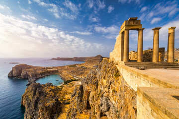 Ruins of Acropolis of Lindos view, Rhodes, Dodecanese Islands, Greek Islands, Greece. Acropolis of Lindos, ancient architecture of Rhodes, Greece. - obrazy, fototapety, plakaty
