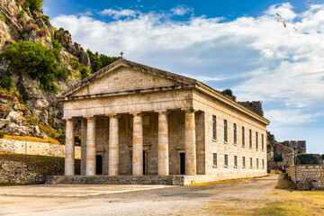 Fototapeta premium The old Venetian fortress of Corfu town and Holy Church of Saint George, Corfu, Greece. The Old Fortress of Corfu is a Venetian fortress in the city of Corfu. Venetian Old Fortress (Palaio Frourio)