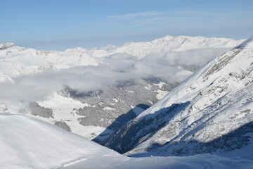 Naklejka premium Snow covered view from Hintertux Glacier on a sunny day