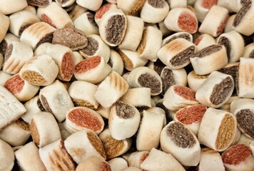 Fondo con detalle y textura de multitud de piezas de alimento para animales