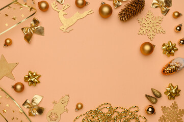 Christmas, winter composition. Flat lay of golden christmas decorations on beige background. Christmas,new year concept.