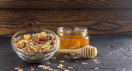 cereal, dried apricots, honey and nuts for breakfast