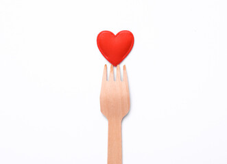 Fork with a heart on a white background. Valentine's Day
