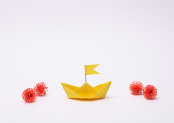 White paper boat with virus molecules on white background
