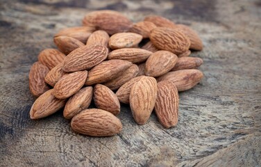 Closeup of Almond Nut Isolated on Wooden Background