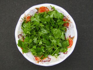 Coriander leaves slices in a bowl 