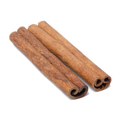 Dry cinnamon stick on a white isolated background, fragrant spice