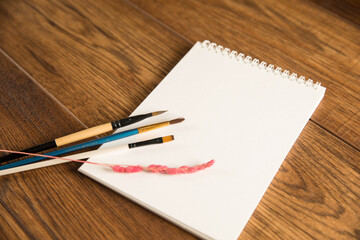 Notepad with brushes