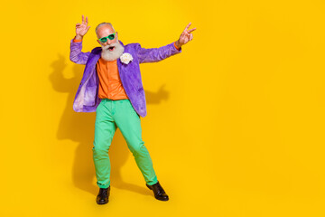 Full size photo of nice grandpa have fun nightclub superstar dance floor wear trendy colorful look...