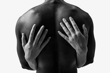 Crop woman embracing ethnic man