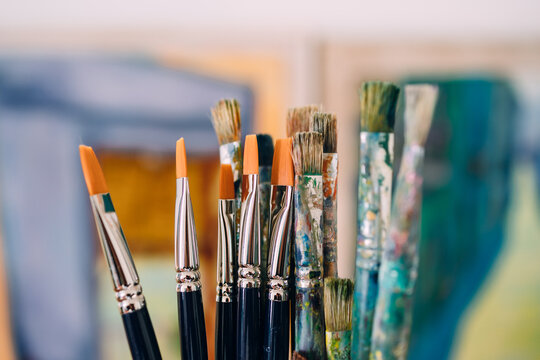 Paint brushes in art studio