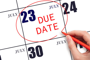 23rd day of July. Hand writing text DUE DATE on calendar date July 23 and circling it. Payment due...