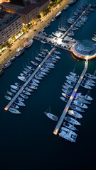 Pula ACI marina at night, aerial view, Croatia