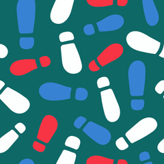 Pattern of footprints. Footprints cartoon. Multicolored human footprints.  Seamless vector background.