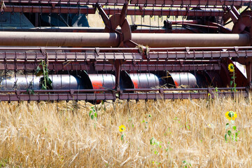 Modern tractor in the field with complex for the plowing. The concept of work in a fields and...