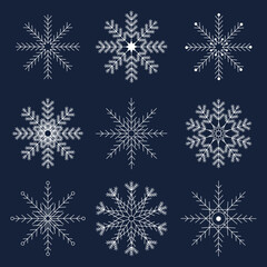 Fototapeta na wymiar Cute snowflake collection isolated on blue background. Flat snow icons, snow flakes silhouette. Nice snowflakes for christmas banner, cards