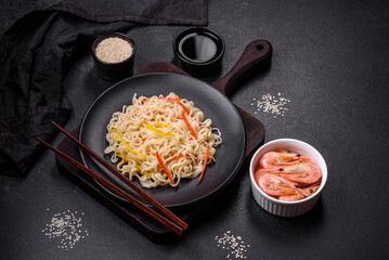 Delicious fresh rice noodles with shrimp, spices and herbs