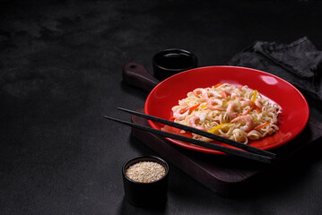 Delicious fresh rice noodles with shrimp, spices and herbs