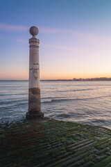 Fototapeta premium Cais das Colunas (Columns Pier) and Tagus River at sunset - Lisbon, Portugal
