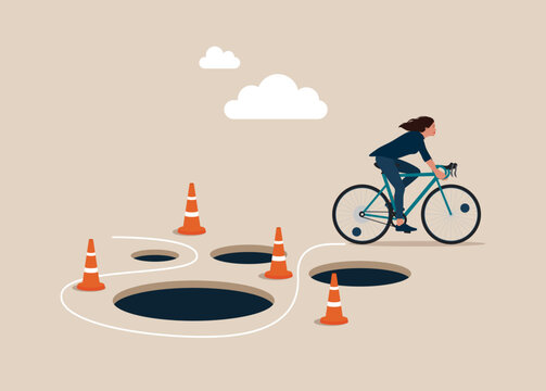 Woman with Bicycle  pass many pitfalls to achieve business success. Avoid pitfall, adversity and brave to around pass mistake or business failure, skill and creativity to solve problem concept.