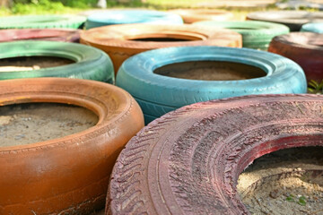 Colorful rubber wheels on the playground.