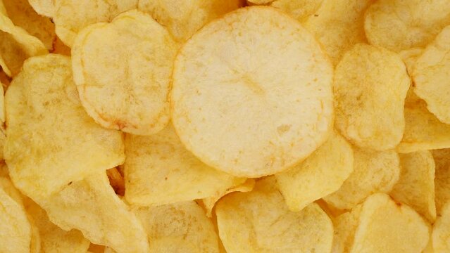Favourite snack Potato chips top view, slider shot