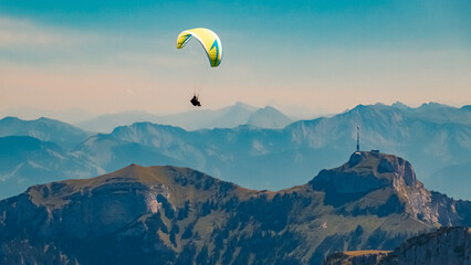Beautiful alpine summer view with a paraglider at the famous Ebenalp, Appenzell, Alpstein,...