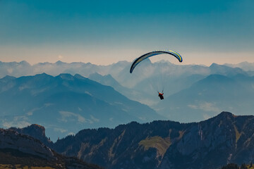 Beautiful alpine summer view with a paraglider at the famous Ebenalp, Appenzell, Alpstein,...