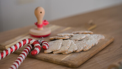 New Year's cookies on the board. New Year's serving. Homemade baking.