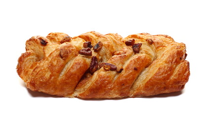Fresh baked pecan bun isolated on white, side view