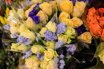 Rose bouquets for sale in a store.
