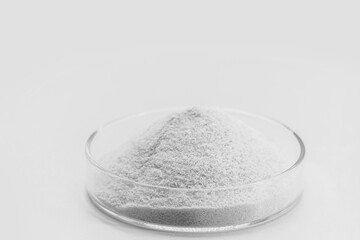 Dicalcium phosphate, known as dibasic calcium or monohydrogen calcium phosphate, powder or microgranules can be used in mixtures for animal feeds with the enriching effect of phosphorus - obrazy, fototapety, plakaty