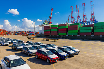 New Car and Shipping containers being unloaded at port facilities in Ashdod, Israel, Containers ships Loading In Ashdod Ports. Israel