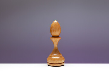 White Chess piece Bishop, officer or elephant. Old wooden Chessman for play the game of chess....