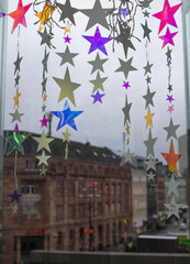 Christmas decorations stars on the background of the window