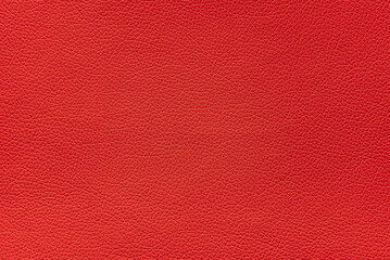 Texture of artificial leather scarlet color, background.