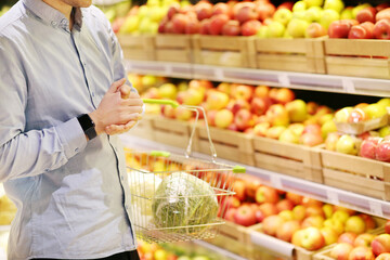 Man buying fruits at the market