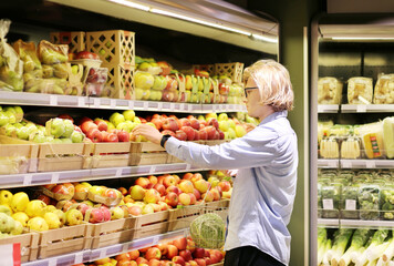 Man buying fruits at the market