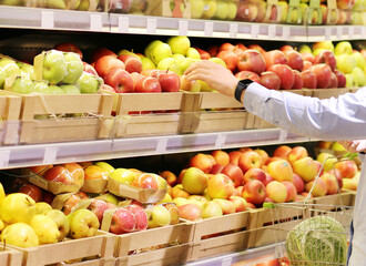 Man buying fruits at the market